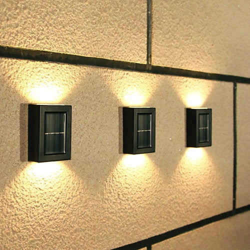 Utendørs solcellevegglampe for hagegjerdet Luvikno