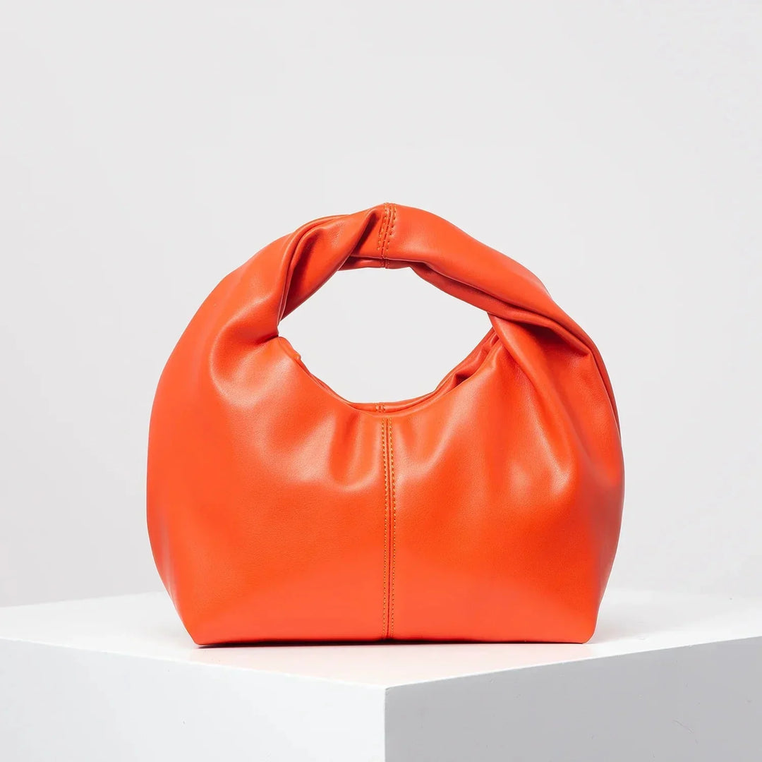 Luvik | Laukku Moteknyteveske Clutch Bag Kädessä oleva laukku