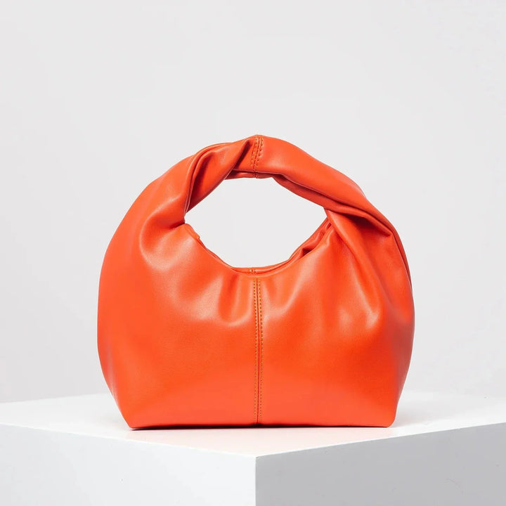 Luvik | Laukku Moteknyteveske Clutch Bag Kädessä oleva laukku