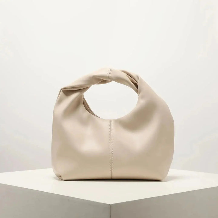 Luvik | Laukku Moteknyteveske Clutch Bag Kädessä oleva laukku