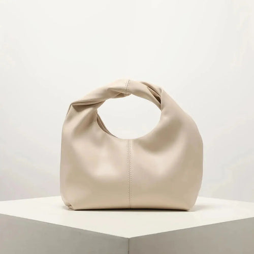 Luvik | Laukku Moteknyteveske Clutch Bag Kädessä oleva laukku