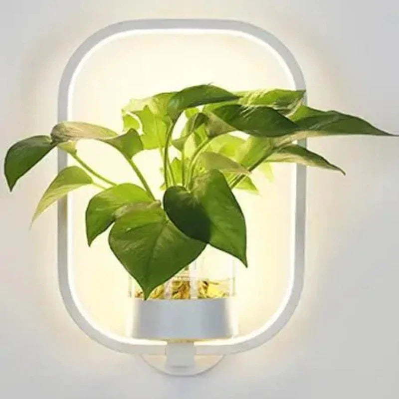 Vegglampe med glassplanteholder Luvikno
