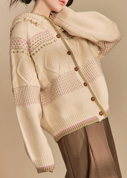 Luvik | Hupparitakki, jossa on neulotut napit ja aprikoosi talvi