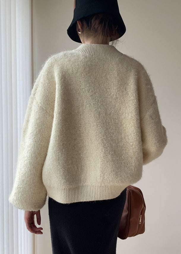 Luvik | Tykke ensfargede ullkåper med lysebeige knapp