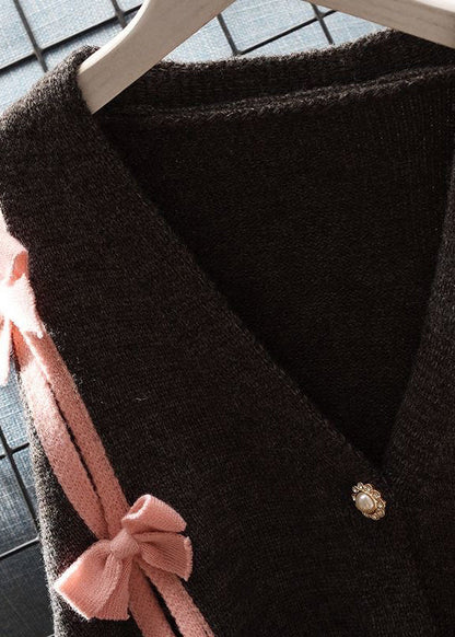 Luvik | V kauluskotelo musta palakappaleilla solmulla