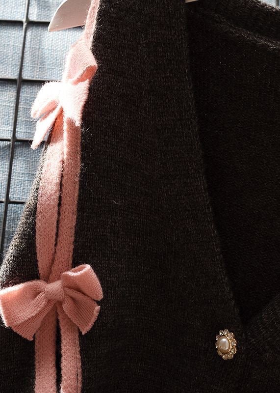 Luvik | V kauluskotelo musta palakappaleilla solmulla