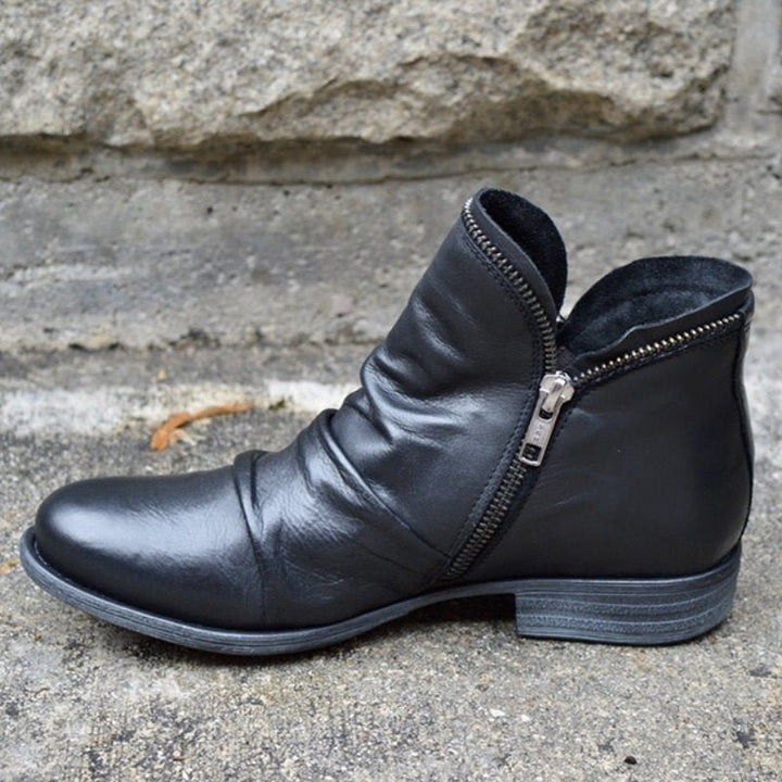 Schwarze Lederstiefeletten mit Reißverschluss