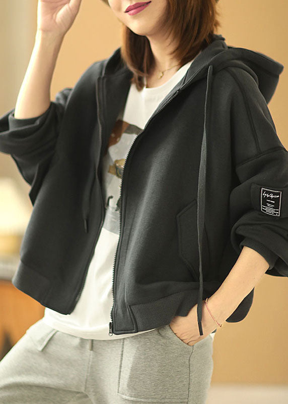 Luvik | Musta huppari vetoketjullisilla taskuilla ja pitkät hihat