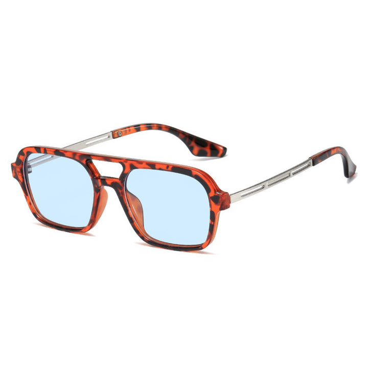 Dame designer solbrille med blå linser Luvikno