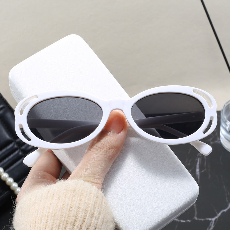Damen modische solbrille med oval ramme og unikt design Luvikno
