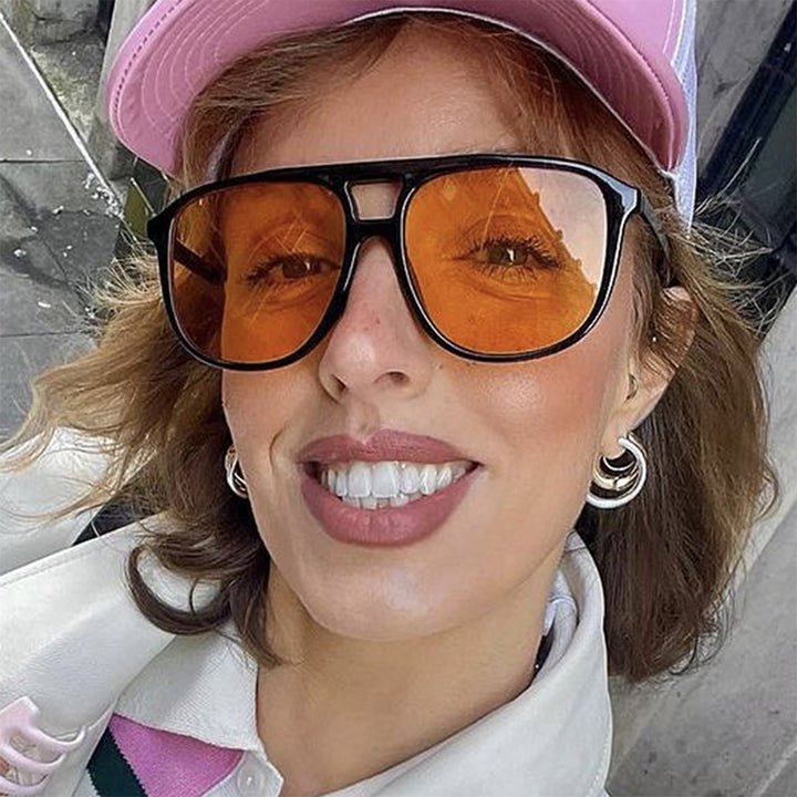 Dame moteriktige solbriller med gjennomsiktig ramme og blå glass Luvikno