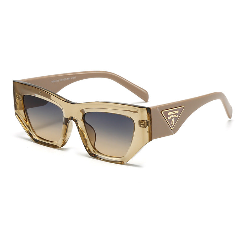 Dame Designer solbrille med moderne, geometrisk ramme Luvikno