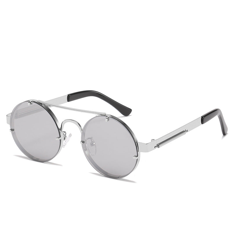 Dame rund designer solbrille med innovativ metallramme og beskyttende linser Luvikno