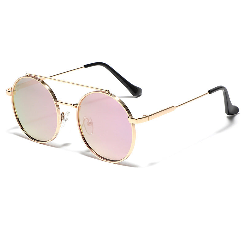Dame rund solbrille med moteramme Luvikno