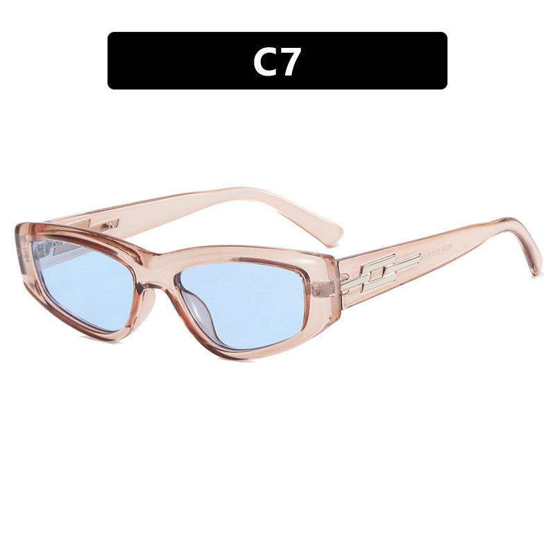 Dame moteriktig Cat-Eye solbrille med transparent ramme og kule glass Luvikno