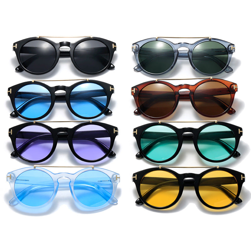 Dame fashionable solbriller med elegante runde glass Luvikno