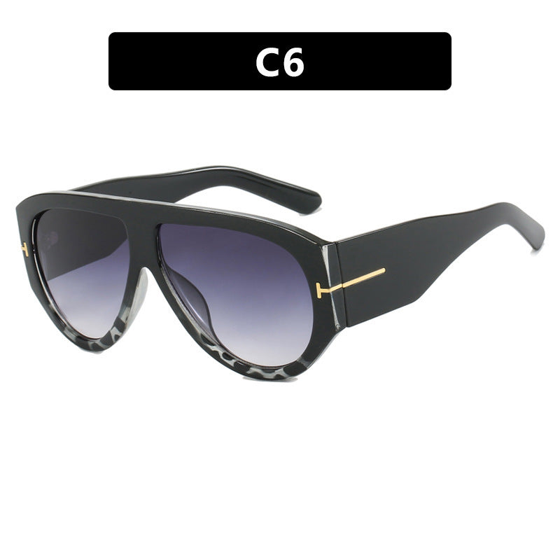 Dame designer-solbriller i elegant retro-design med bred ramme Luvikno