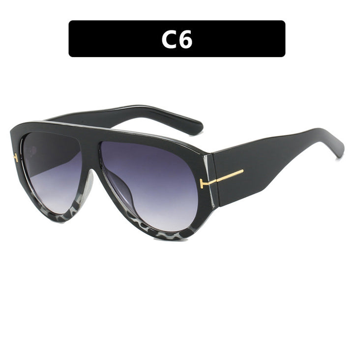 Dame designer-solbriller i elegant retro-design med bred ramme Luvikno