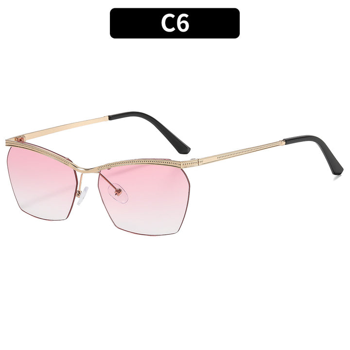 Dame moterik solbrille med filigran ramme og myk fargegradient Luvikno