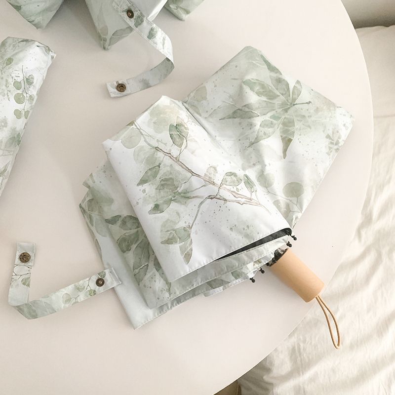 Damer Faltparaply med botanisk trykkdesign Luvikno