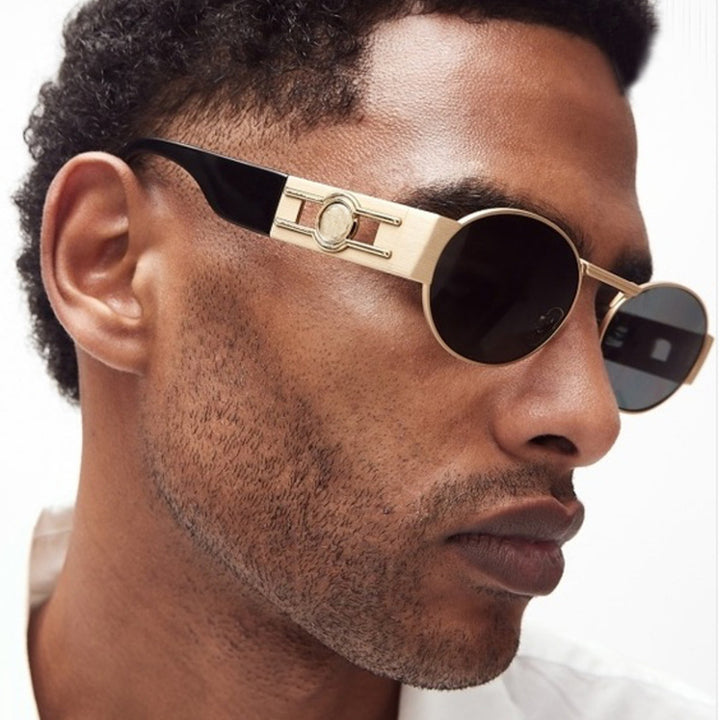 Dame rund solbrille med moderne metallramme og UV-beskyttelse Luvikno