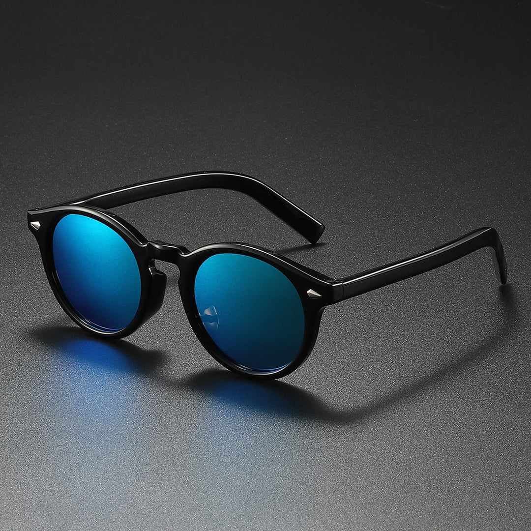 Dame Rund-solbrille med transparent ramme og reflekterende glass Luvikno