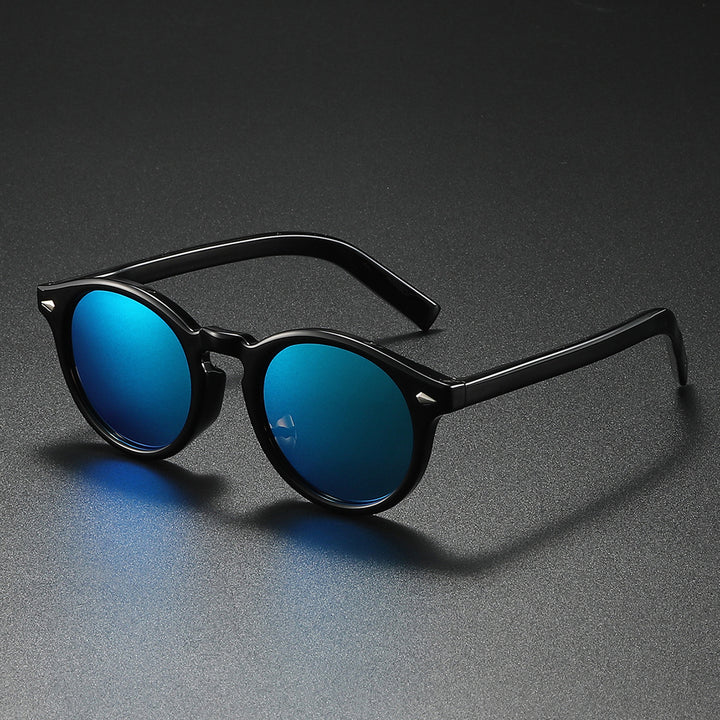 Dame Rund-solbrille med transparent ramme og reflekterende glass Luvikno