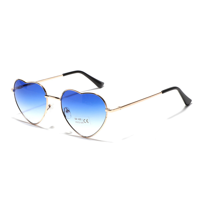 Dame hjerteformet solbrille med UV-beskyttelse og delikat ramme Luvikno
