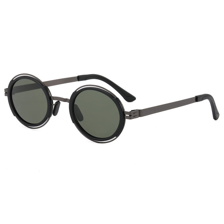 Damer moteriktig rund solbrille med elegant metallramme Luvikno