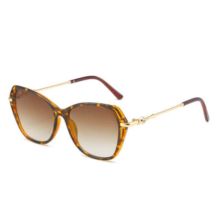 Dame moter Cat-Eye solbrille med elegant metallramme Luvikno