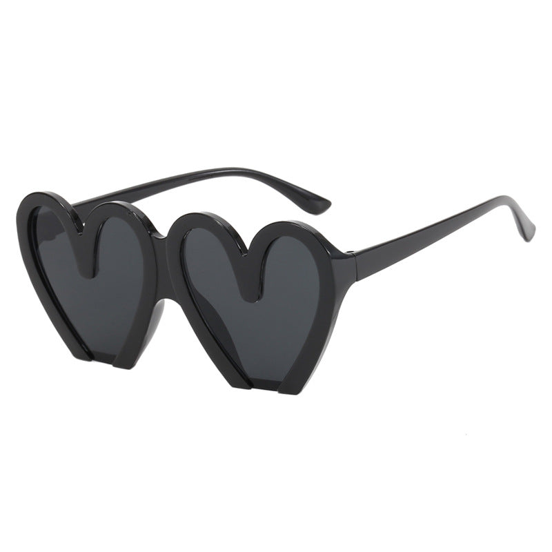 Damer hjerteformet solbrille med robust plastramme og UV-beskyttelse Luvikno