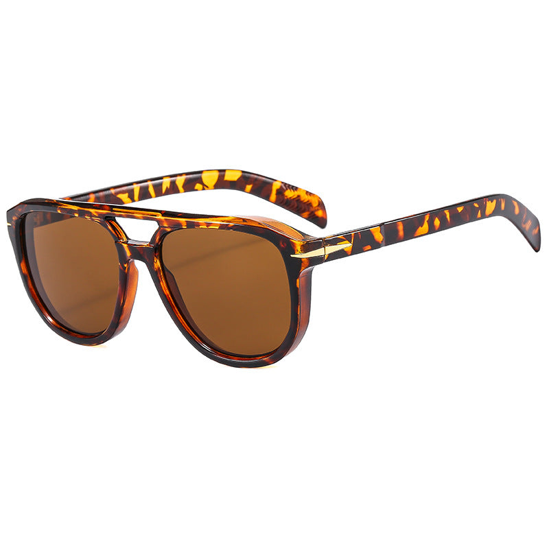 Dame solbrille med markant ramme og beskyttende linser Luvikno