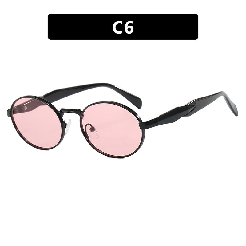 Dame moteriktig solbrille i elegant ovaldesign med trendy detaljer Luvikno
