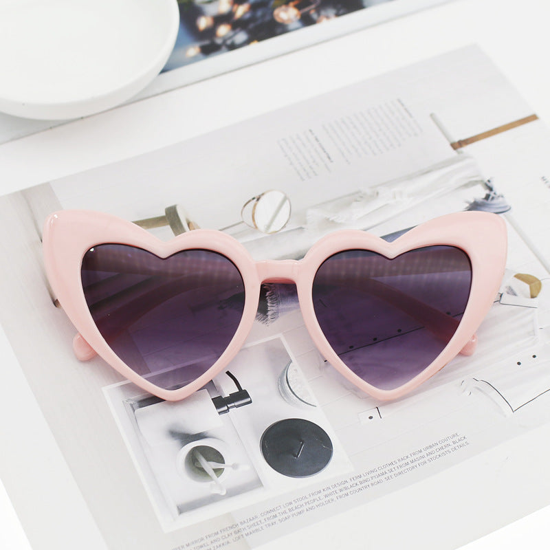 Dame hjerteformet solbrille med glitrende ramme Luvikno