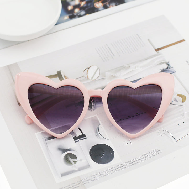 Dame hjerteformet solbrille med glitrende ramme Luvikno