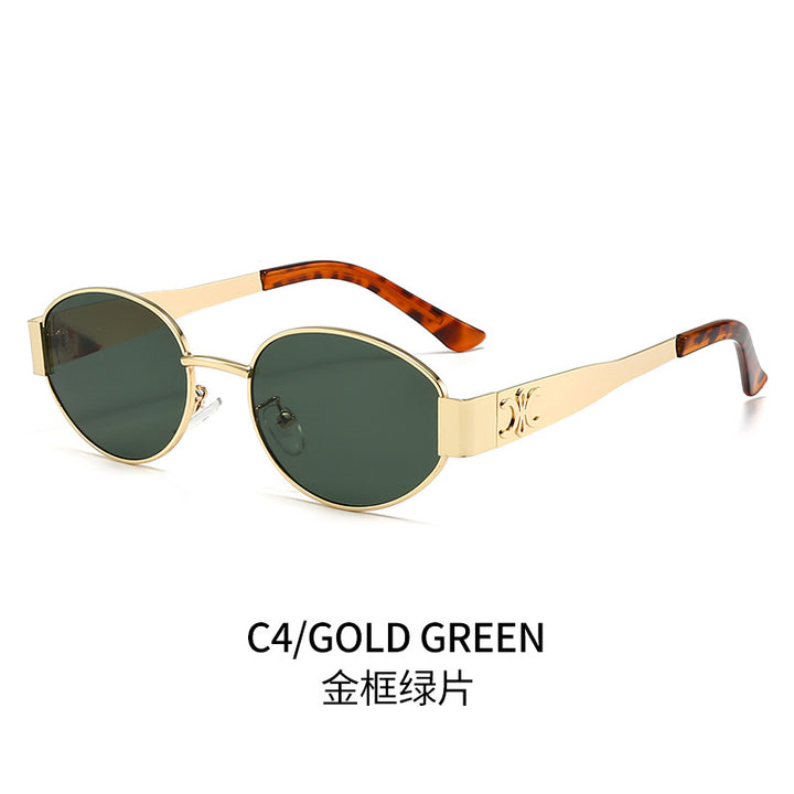 Dame Designer-solbrille med elegant oval ramme og unike aksenter Luvikno