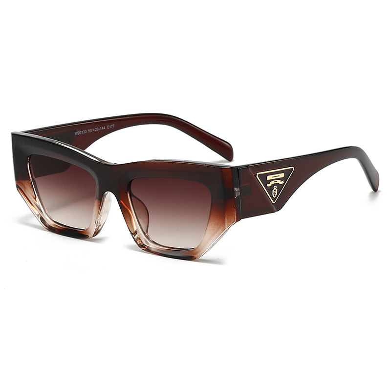 Dame Designer solbrille med moderne, geometrisk ramme Luvikno