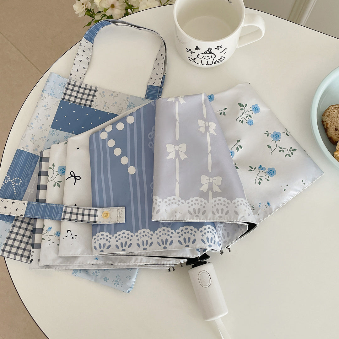 Damer paraply i romantisk patchwork-design Luvikno