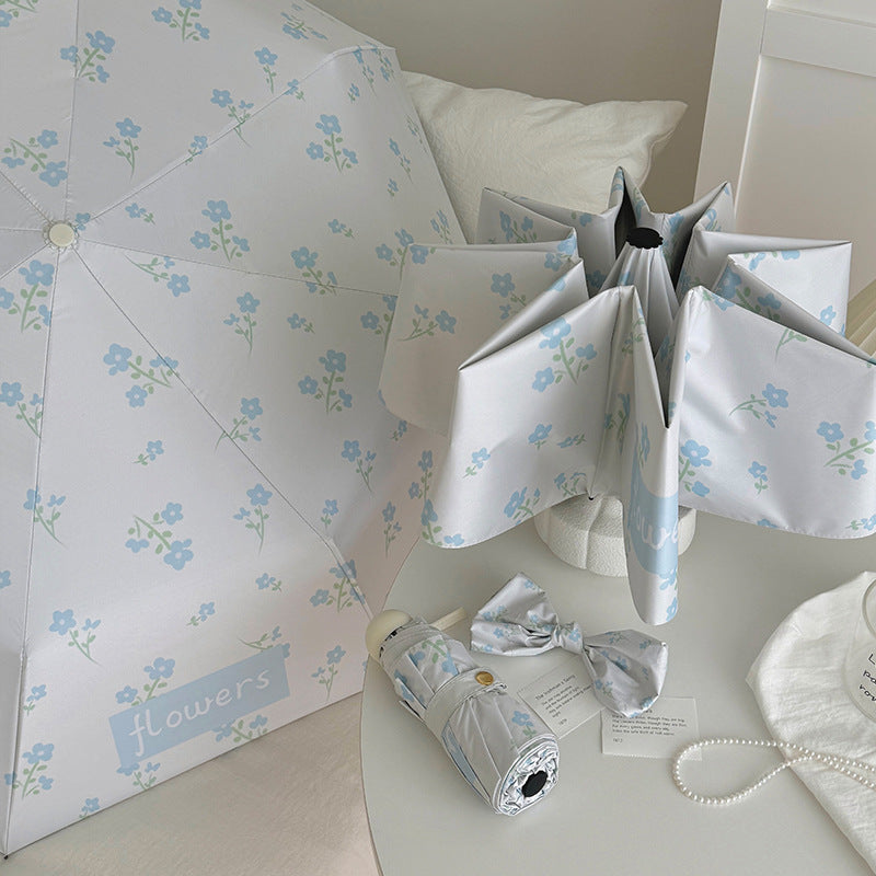 Damer Faltende Paraply med stilfullt blomsterdesign Luvikno