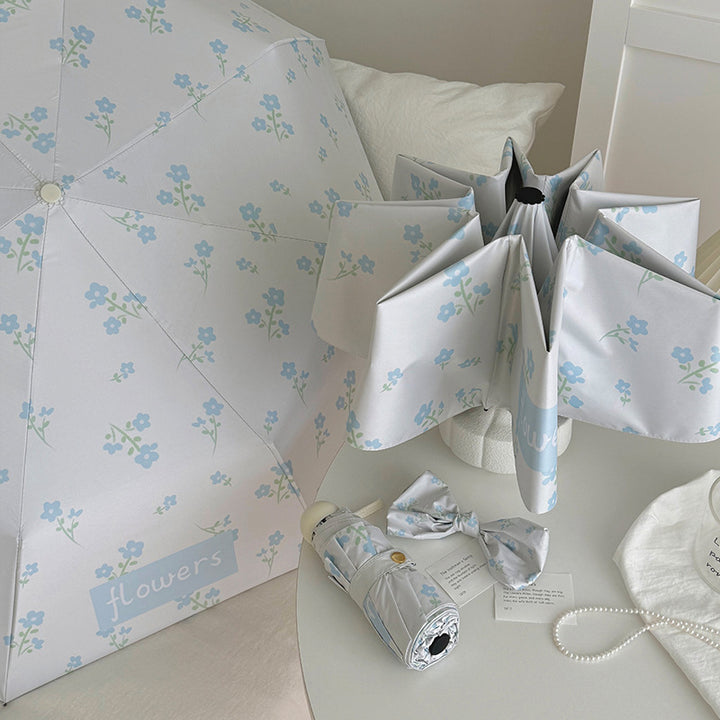 Damer Faltende Paraply med stilfullt blomsterdesign Luvikno