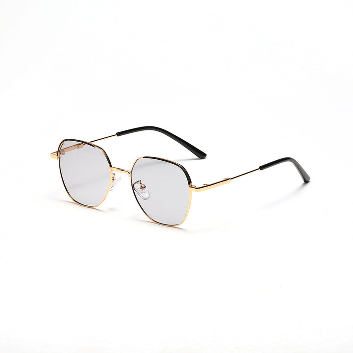 Dame moteriktig solbrille med smal metallramme og blå linser Luvikno