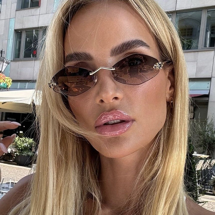 Dame geometrisk solbrille med dobbelt metallramme og beskyttende linser Luvikno