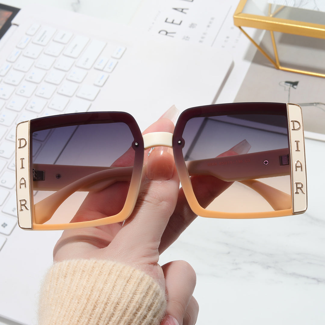 Dame solbrille i moderne kvadratisk design Luvikno