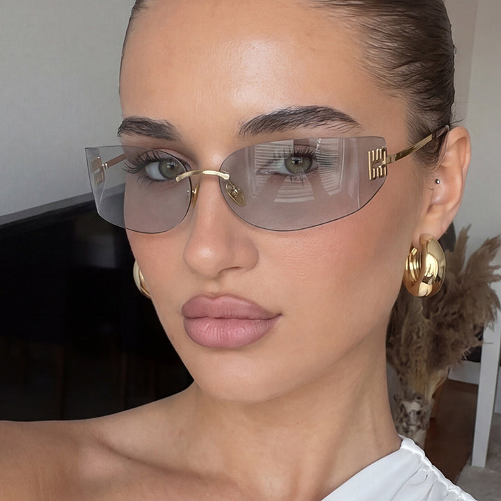 Dame futuristisk designer solbrille med uvanlig ramme og UV-beskyttelse Luvikno
