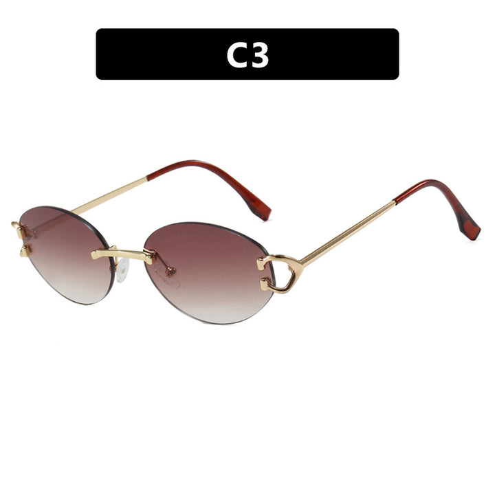 Dame elegant ovalformet solbrille med moderne metalramme Luvikno