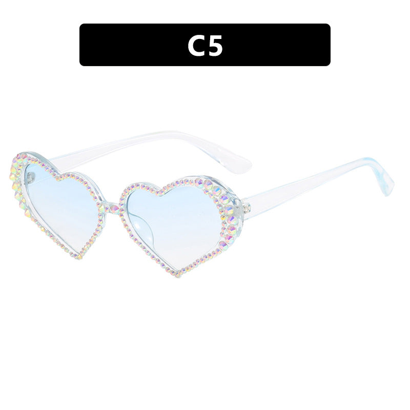 Dame hjerteformet solbrille med strassbesatt ramme Luvikno