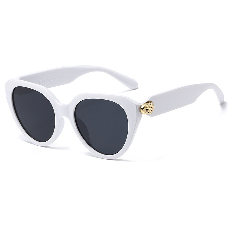 Dame Cat-Eye solbriller med gullige detaljer og beskyttende UV-filter Luvikno