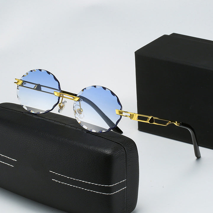 Dame rund solbrille med unikt bølgedesign og høykvalitets metallramme Luvikno