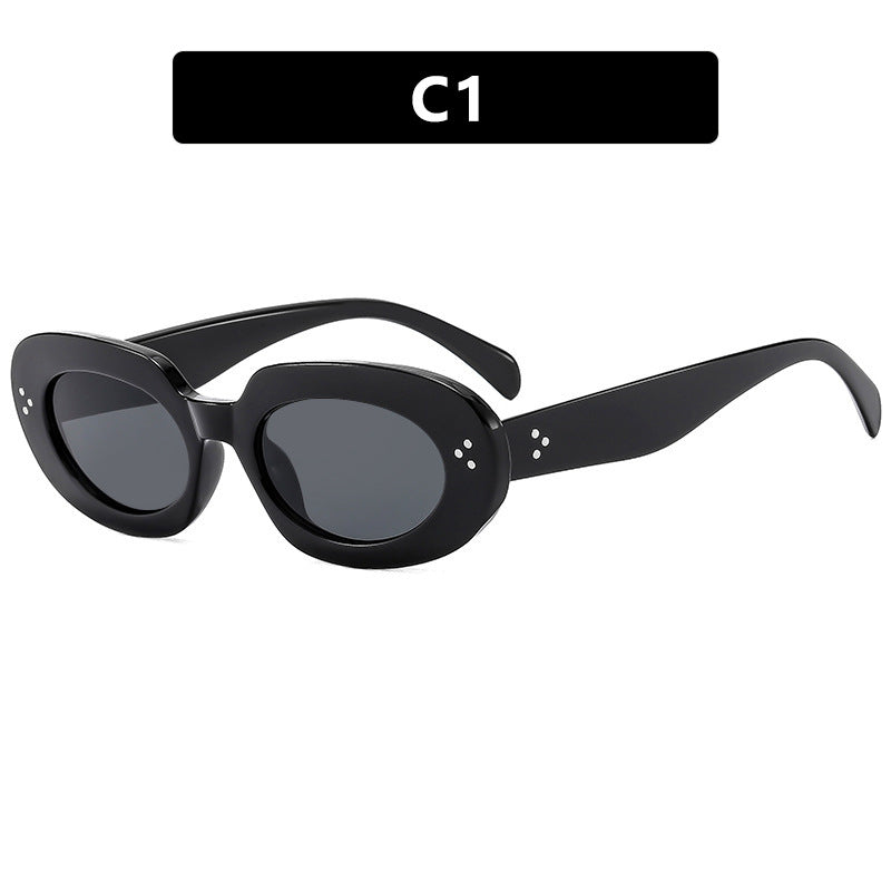 Dame moteriktig solbrille med unikt ovalt ramme og beskyttende glass Luvikno