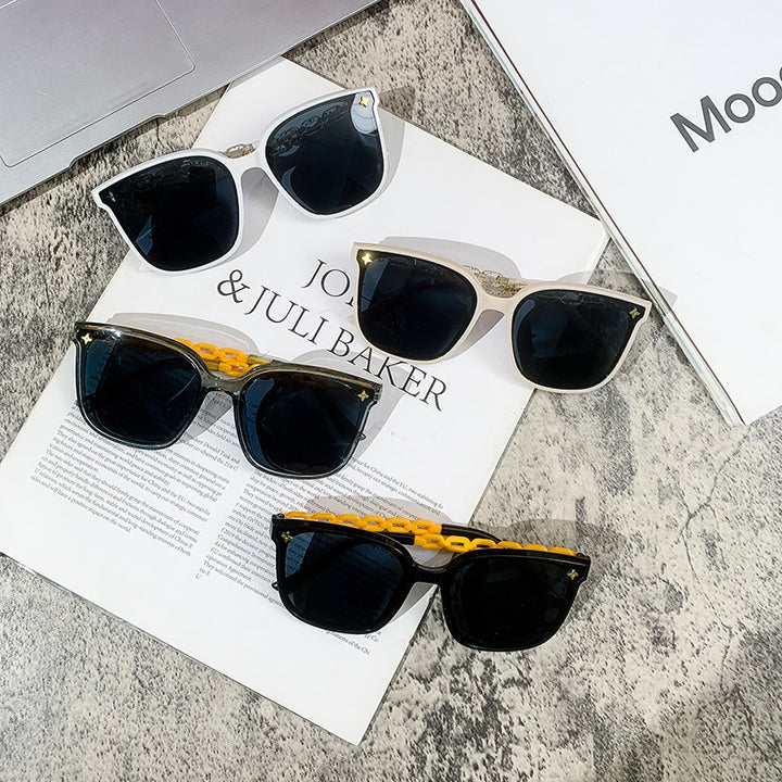 Dame ekstrastor solbrille med modig kjedeinnramming Luvikno
